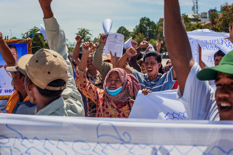 Protesters representing 816 families in Kampot province rally in Phnom Penh's Freedom Park on Monday. (Jens Welding Ollgaard/The Cambodia Daily)