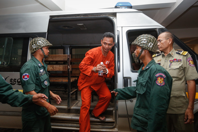 Pech Prum Mony arrives at the Phnom Penh Municipal Court for the first day of his trial on Friday. (Siv Channa/The Cambodia Daily)