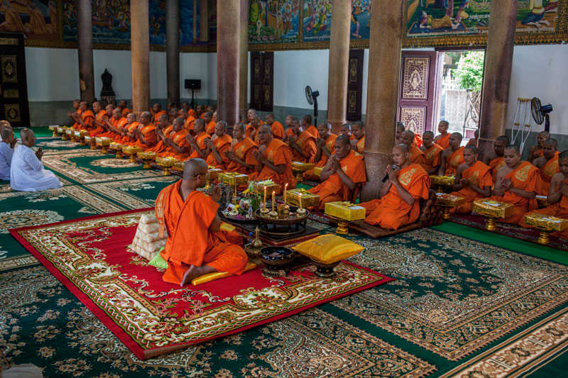 Monks chant at Phnom Penh's Wat Langka pagoda Monday during a ceremony to bless urns discovered there in February. (Jens Welding Ollgaard/The Cambodia Daily)