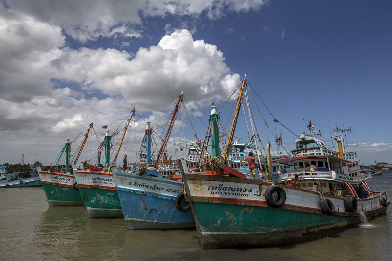 Fishing boats docked at a port in Thailand's Samut Songkhram province in July. (Reuters)