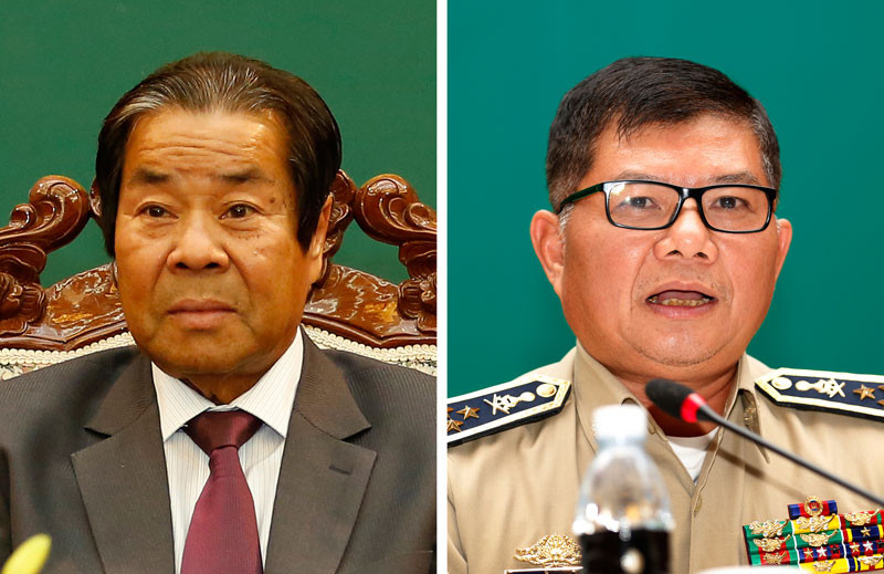 Interior Ministry Secretary of State Em Sam An, left, and National Police Deputy Commissioner Chhay Sinarith (Siv Channa/The Cambodia Daily)