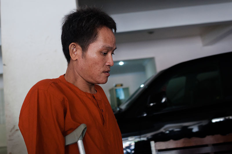 Ly Sao, a former bodyguard of Thong Sarath, leaves the Phnom Penh Municipal Court on Wednesday. (Jens Welding Ollgaard/The Cambodia Daily)