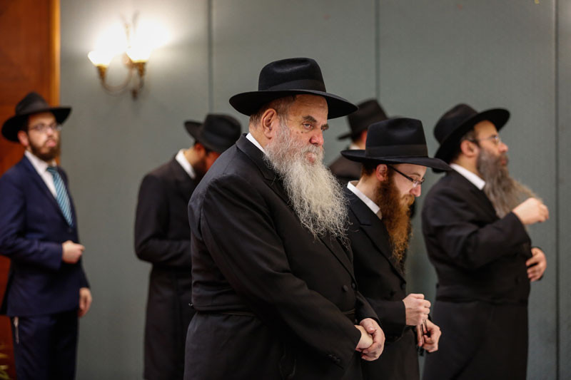 Orthodox Jewish men wait for the start of an inauguration ceremony for Phnom Penh's new Chabad Jewish Center, at the Himawari hotel on Tuesday. (Siv Channa/The Cambodia Daily)