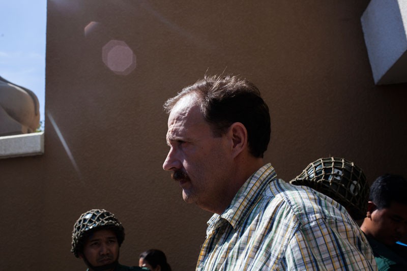 Gregg Fryett leaves the Phnom Penh Municipal Court following a hearing on Wednesday. (Jens Welding Ollgaard/The Cambodia Daily) 