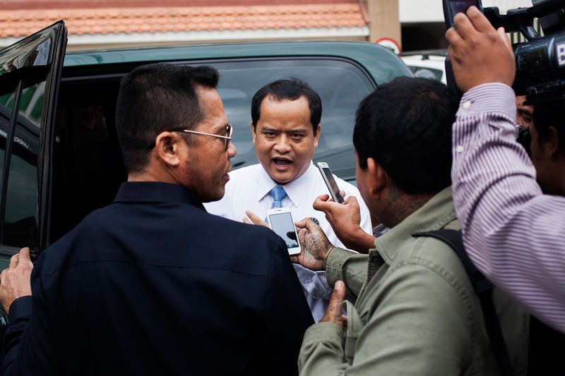 Jens Welding Ollgaard/The Cambodia Daily Sourn Serey Ratha speaks to reporters outside the Phnom Penh Municipal Court on Monday.