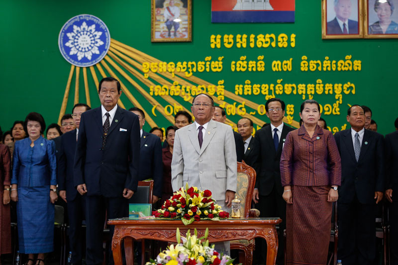 National Assembly President Heng Samrin, center, presides over a ceremony in Phnom Penh on Wednesday to mark the 37th anniversary of the creation of the Salvation Front. (Siv Channa/The Cambodia Daily)