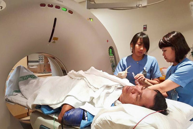 Prime Minister Hun Sen undergoes a CT scan in Singapore in this photograph posted to his Facebook page on Wednesday.