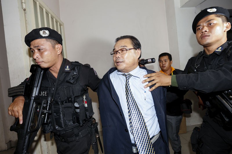 CNRP Vice President Kem Sokha emerges from the Phnom Penh Municipal Court in April after being questioned for seven hours over protests that followed the 2013 national election.