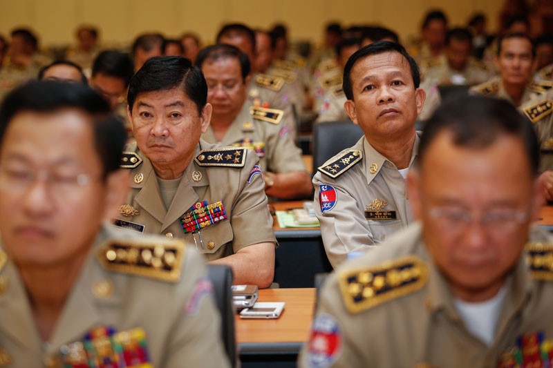Police officials listen during a workshop on the new traffic law at the Interior Ministry in Phnom Penh on Thursday. (Siv Channa/The Cambodia Daily)