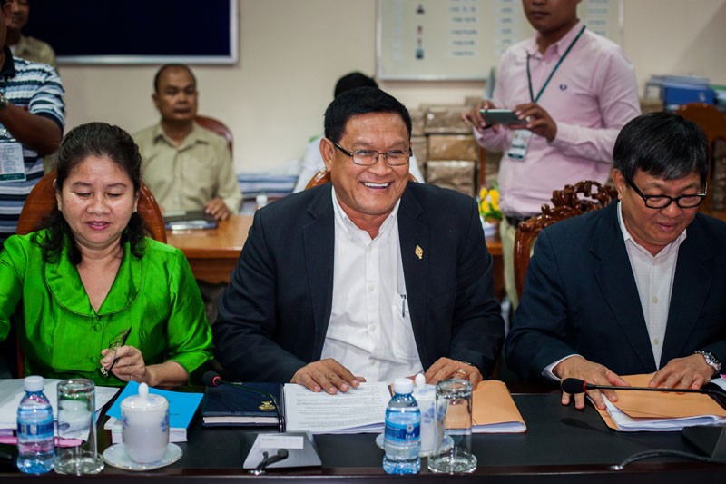 From left, CNRP lawmakers Ke Sovannaroth, Keo Phirum and Son Chhay attend a meeting with the CPP about the draft union law on Thursday. (Jens Welding Ollgaard/The Cambodia Daily)