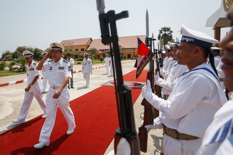 Chinese naval commander Yu Manjiang salutes Cambodian sailors at the Navy Headquarters in Phnom Penh yesterday. (Siv Channa/The Cambodia Daily)