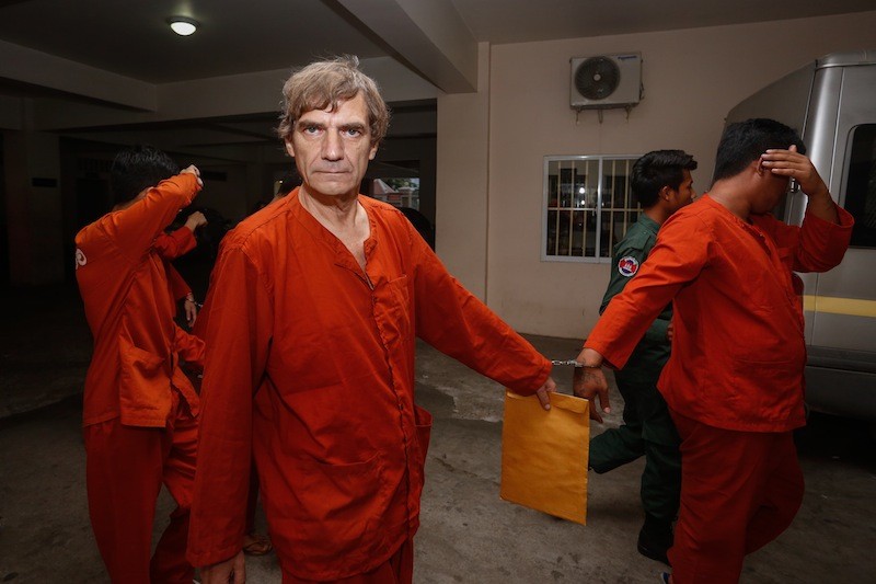 German national Udo Sabiniewicz leaves the Phnom Penh Municipal Court on Thursday. (Siv Channa/The Cambodia Daily)