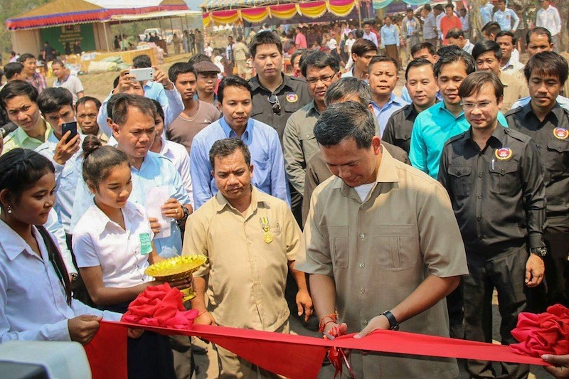 Prime Minister Hun Sen's eldest son, Hun Manet, cuts the ribbon at an inauguration ceremony for four primary schools in Koh Kong's Areng Valley in March, in a photo posted to his Facebook page.