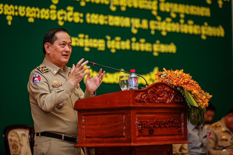 Sok Phal, head of the Ministry of Interior's immigration department, speaks at an annual meeting in Phnom Penh on Tuesday. (Siv Channa/The Cambodia Daily)