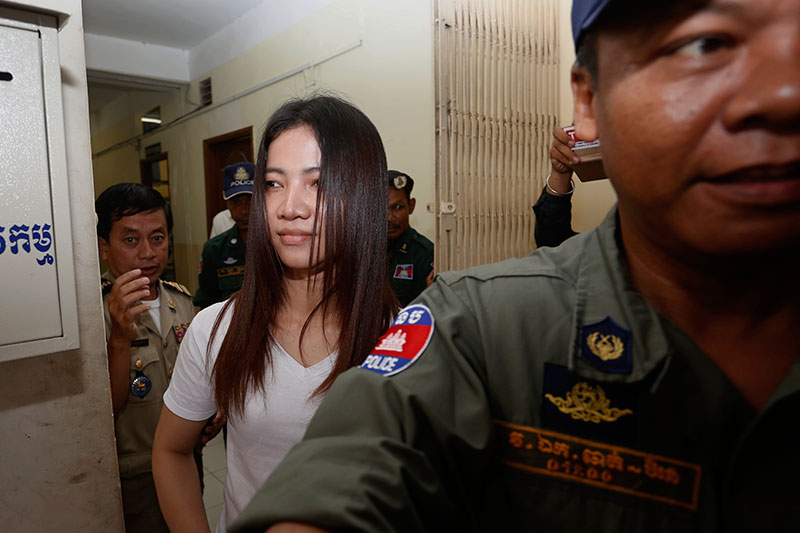 Khem Chandaraty leaves the Interior Ministry's anti-terrorism department in Phnom Penh following questioning Friday. (Siv Channa/The Cambodia Daily)