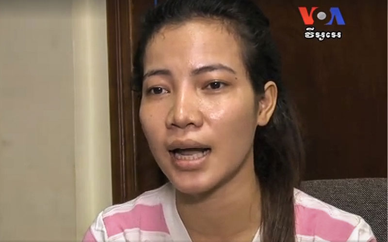 Khem Chandaraty speaks to a reporter at Adhoc's office in Phnom Penh on Wednesday in this still image from a video posted online by the Voice of America news service.