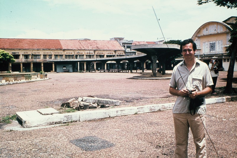 Mr. Bergstrom stands outside a former bus station in Kompong Cham province.