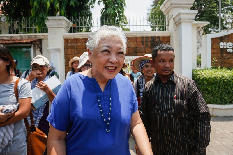 Thida Khus, the head of women's rights group Silaka, leaves the Anti-Corruption Unit's headquarters in Phnom Penh on Thursday. (Siv Channa/The Cambodia Daily)