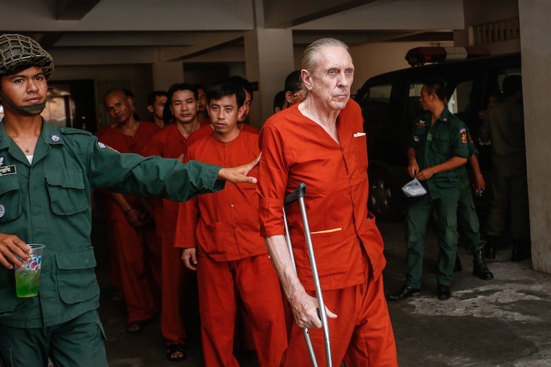 British national Peter Gold is led out of the Phnom Penh Municipal Court on Wednesday after his trial on charges of drug use and trafficking. (Siv Channa/The Cambodia Daily)