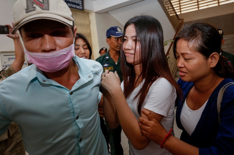 Khem Chandaraty, an alleged mistress of deputy opposition leader Kem Sokha, leaves the Interior Ministry in Phnom Penh last month after being questioned by anti-terrorism police. (Siv Channa/The Cambodia Daily)