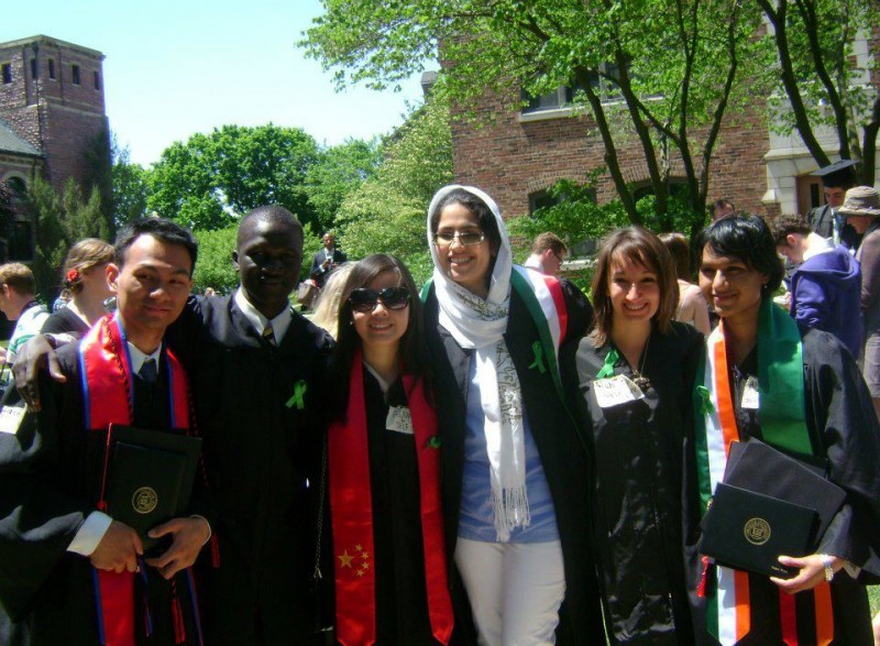 Dara Veung, left, at the Grinell College graduation in May 2012. (Elias Butras Elias)