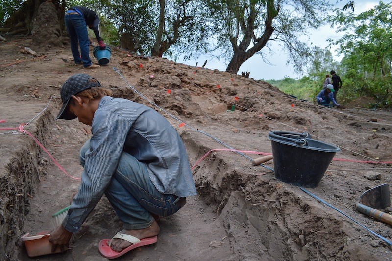 A worker excavates an Angkor-era kiln near Cheung Ek lake on Wednesday. (Ben Paviour/The Cambodia Daily)