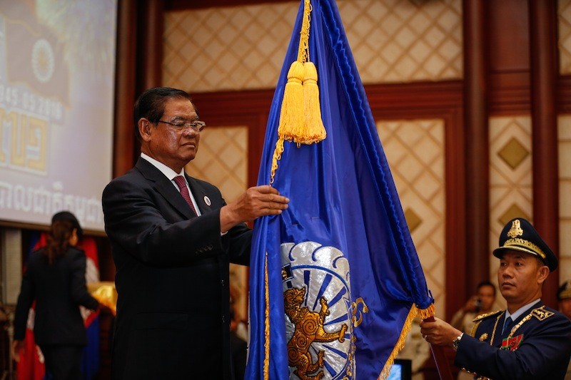 Interior Minister Sar Kheng speaks at a ceremony marking the 71st anniversary of the national police in Phnom Penh yesterday. (Siv Channa/The Cambodia Daily)