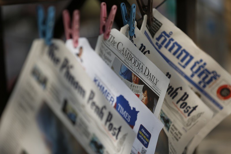 Local English-language newspapers for sale at a newsstand in Phnom Penh on Monday. (Siv Channa/The Cambodia Daily)