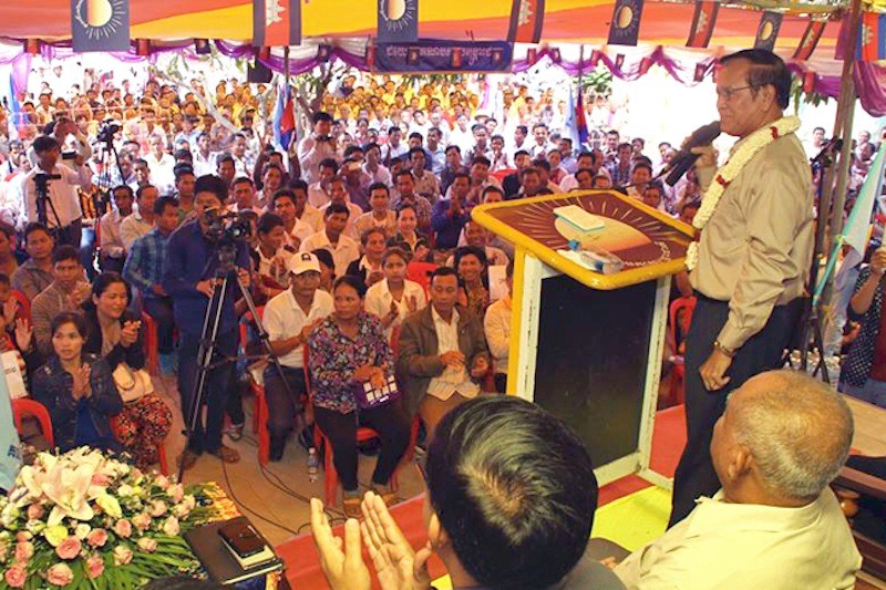 Deputy opposition leader Kem Sokha speaks to supporters in Svay Rieng province on Sunday, in a photograph posted to his Facebook page. 