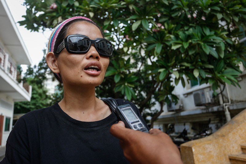 Activist Yorm Bopha speaks to reporters outside the Appeal Court in Phnom Penh on Monday. (Siv Channa/The Cambodia Daily)