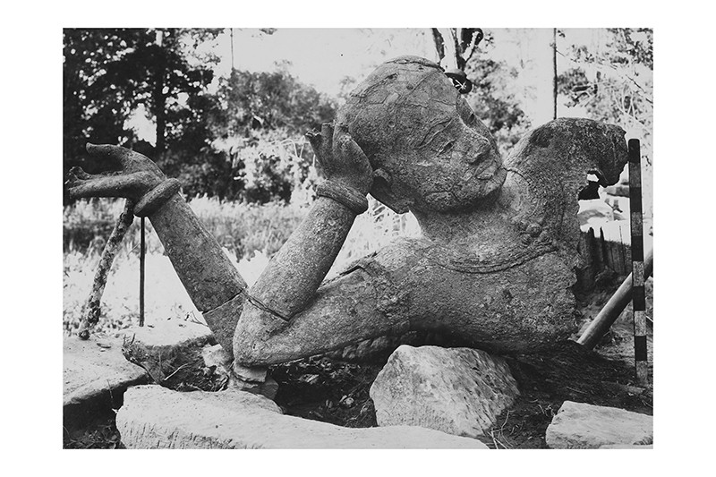 A reclining bronze Vishnu statue at the Angkor Archaeological Park’s West Mebon monument in 1936 (EFEO)