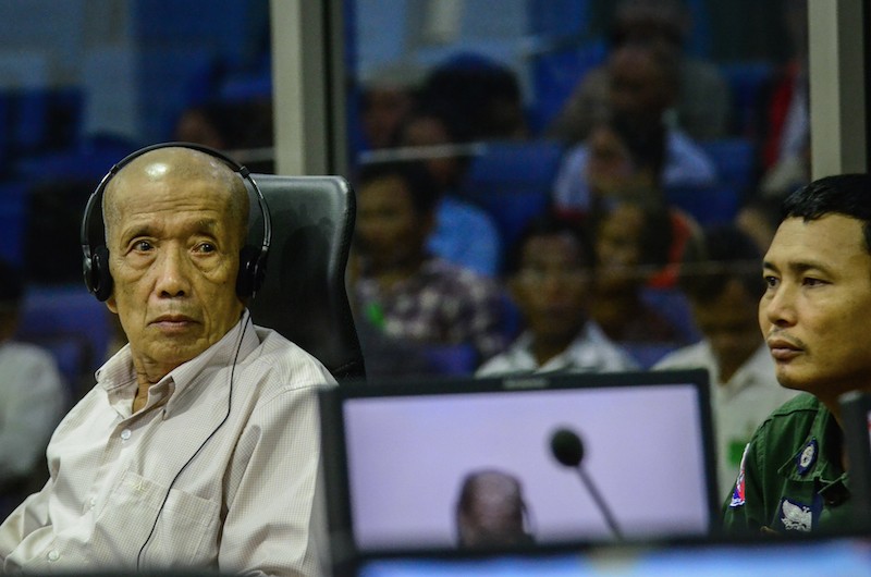 Duch listens during proceedings at the Khmer Rouge tribunal in Phnom Penh on Thursday. (ECCC)
