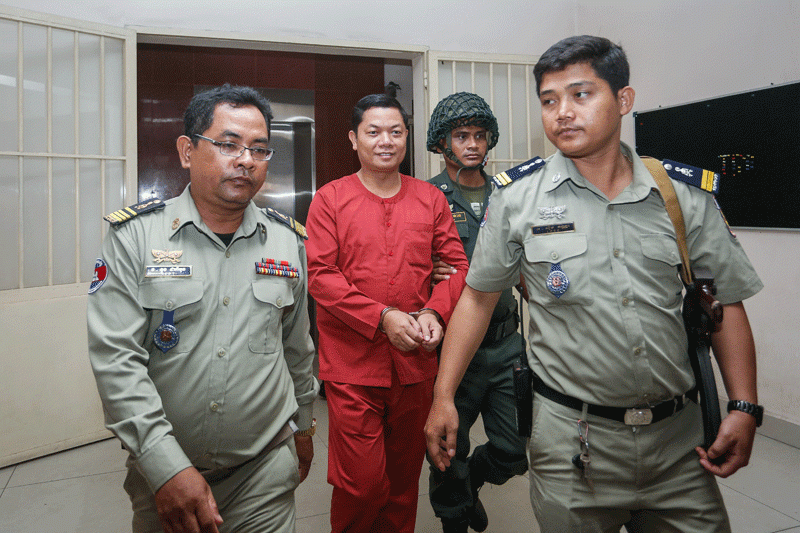 Sung Bonna leaves the Phnom Penh Municipal Court on Friday. (Siv Channa/The Cambodia Daily)
