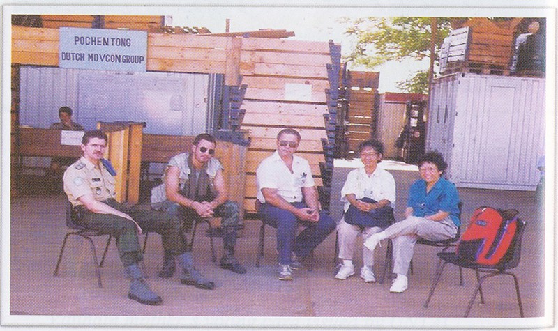 Ms. Vannath, second from right, waits for a UN helicopter at Pochentong International Airport in April 1993. (Chea Vannath collection)