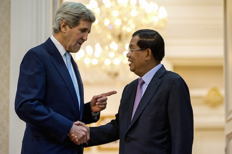 U.S. Secretary of State John Kerry, left, speaks with Prime Minister Hun Sen at Mr. Hun Sen’s office building in Phnom Penh during a visit in January. (Pring Samrang/Reuters)