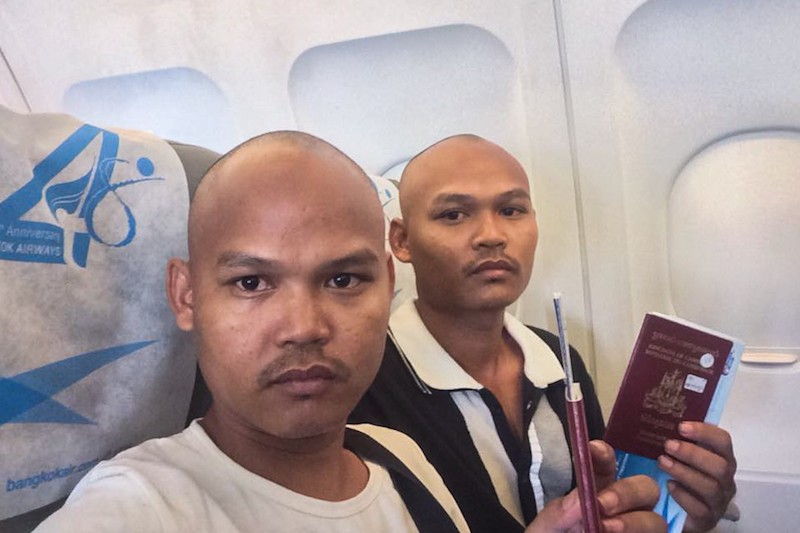Chum Huor and Chum Huot on a Bangkok Airways flight out of Cambodia in a photograph posted to their Facebook page on Thursday morning.