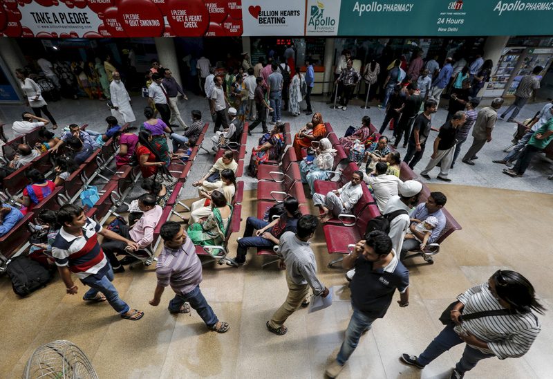 Patients wait inside the Indraprastha Apollo Hospital in New Delhi last year. (Reuters)