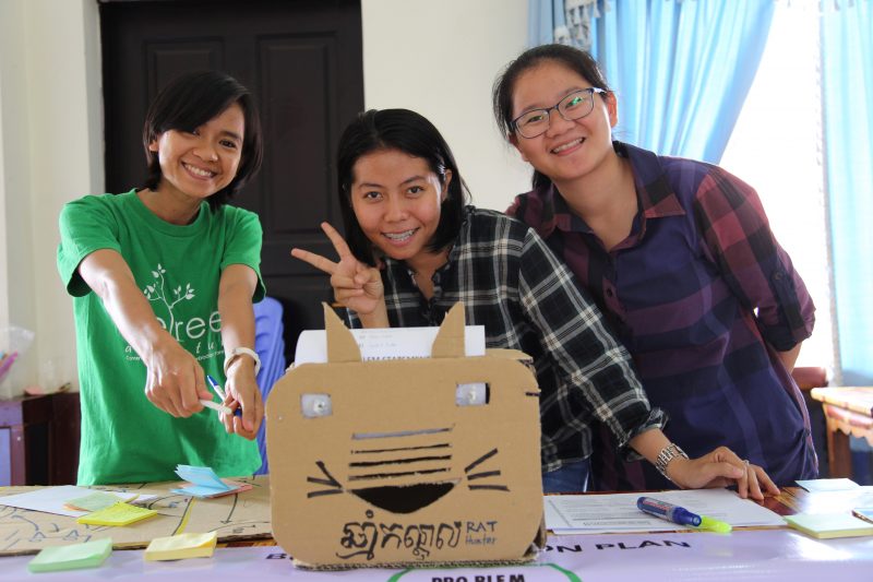 Leang Chanthy, Phauk Pauvrachana and Meas Likun show off their winning team’s invention at a Phnom Penh makerthon earlier this month. (OnePlus Media)
