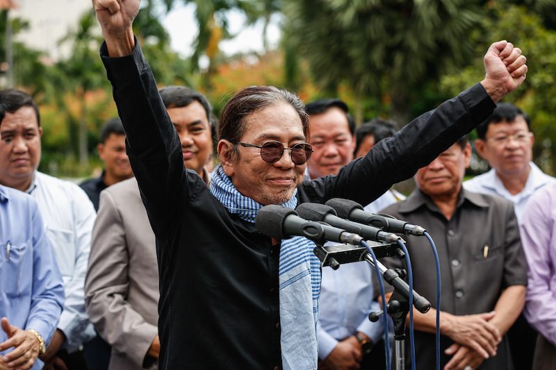 ABC radio owner Seng Bunveng speaks to reporters and supporters during a ceremony at Phnom Penh City Hall on Tuesday. (Siv Channa/The Cambodia Daily)