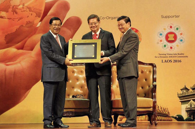 Prime Minister Hun Sen is given a lifetime achievement award by the Asian Strategy and Leadership Institute during a ceremony on Saturday in Laos, in a photograph posted to his Facebook page.