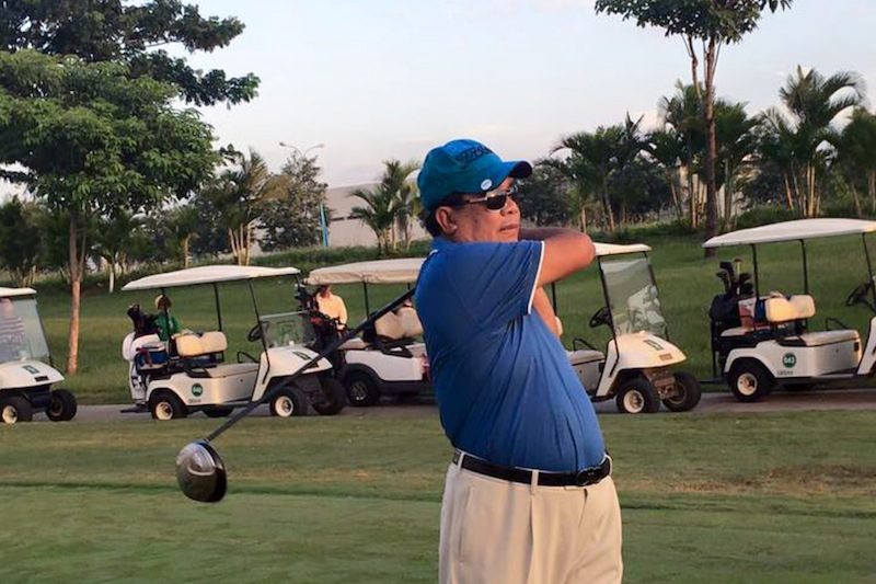 Prime Minister Hun Sen plays golf in a photograph posted to his Facebook page last month.