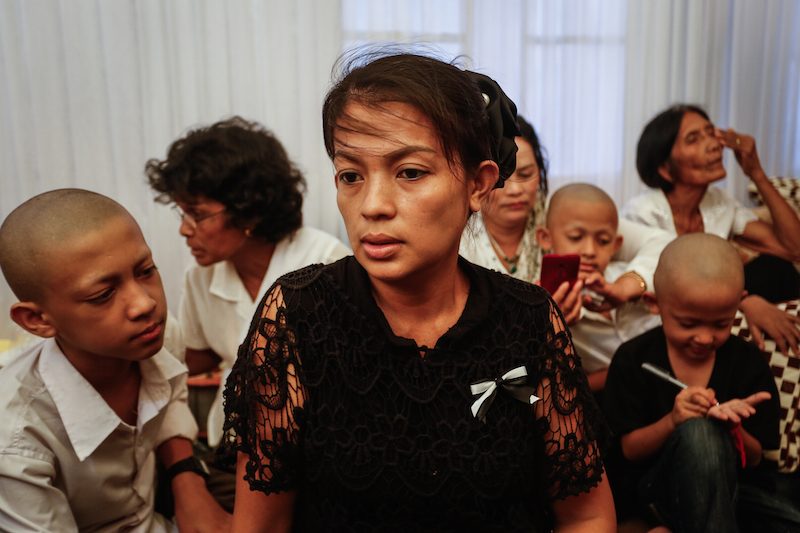 Bou Rachana, Kem Ley’s widow, attends a funeral ceremony for her late husband in Phnom Penh in July. (Siv Channa/The Cambodia Daily) 
