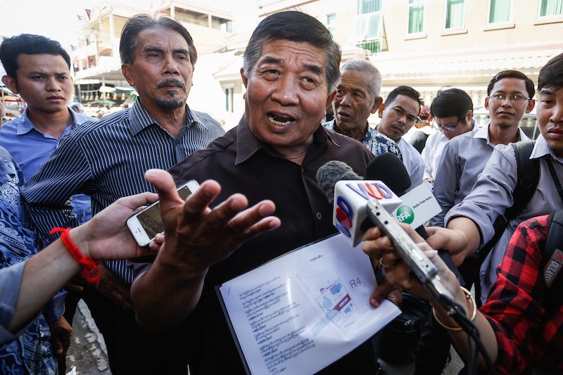 Ahmad Yahya, a secretary of state at the Ministry of Social Affairs, speaks to reporters outside the Phnom Penh Municipal Court on Monday. (Siv Channa/The Cambodia Daily)