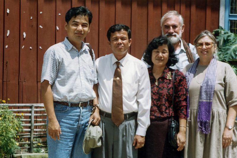 Helen Jarvis, far right, stands with DC-Cam director Youk Chang, far left, and others during a 1996 trip to visit mass graves in Takeo province. (DC-Cam)