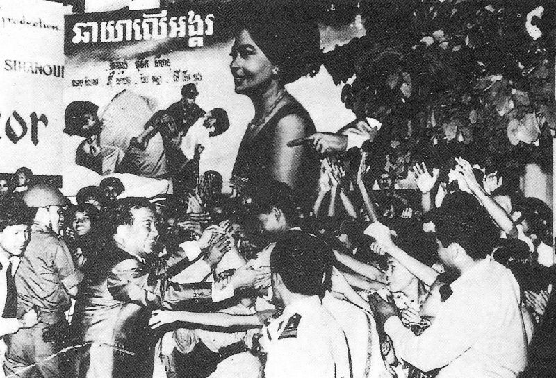 Prince Sihanouk greets supporters at a publicity event for a film in the 1960s.