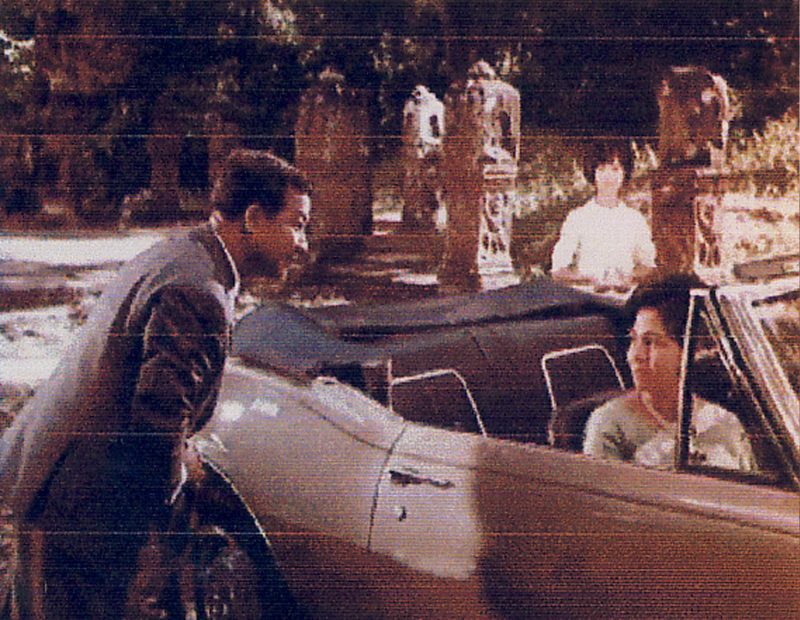 Prince Sihanouk speaks to Princess Norodom Monineath in a scene from his film 'Crepuscule.'