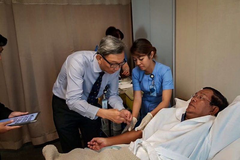 Prime Minister Hun Sen during a medical examination in Singapore late last month, in a photograph posted to his Facebook page