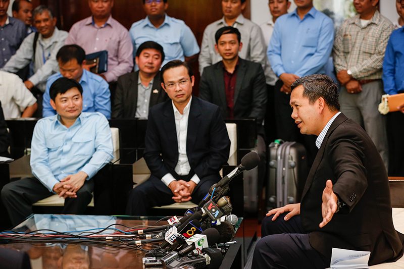 Prime Minister Hun Sen’s eldest son, Hun Manet, speaks to reporters during a news conference at Phnom Penh International Airport in April. (Siv Channa/The Cambodia Daily) 