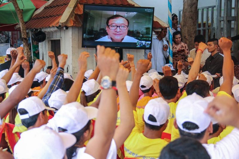 Opposition leader Sam Rainsy addresses CNRP youth members earlier this month via videolink during a meeting at the party’s Phnom Penh headquarters, in a photograph posted to his Facebook page.