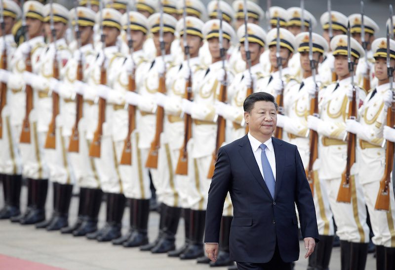 Chinese President Xi Jinping inspects an honor guard at the Great Hall of the People in Beijing last month. (Reuters)